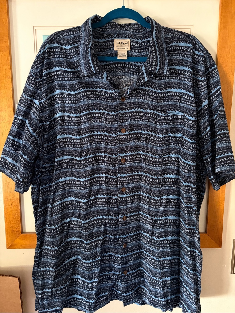 L.L. Bean Men's Navy and Light Blue Patterned Short-Sleeve Button-Down Shirt.